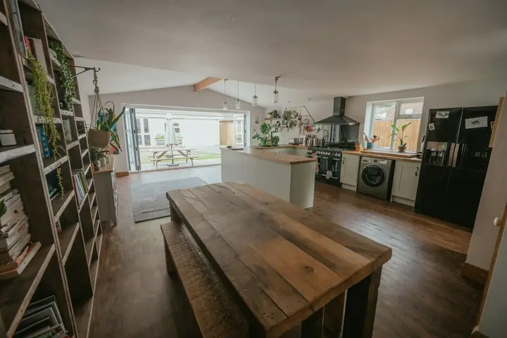 Open-plan kitchen extension with doors to the garden