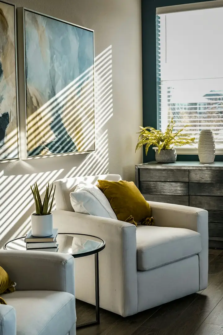 Sunlight streaming through a window across an armchair